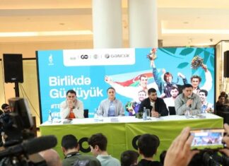 MOK-un təşəbbüsü ilə tanınmış güləşçilərin idmansevərlərlə görüşü keçirilib